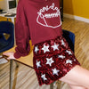 tiered maroon sequin skirt with white stars