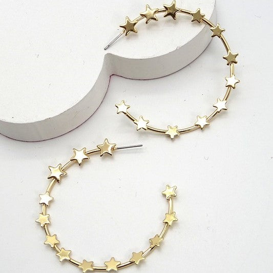 gold hoop earrings with stars