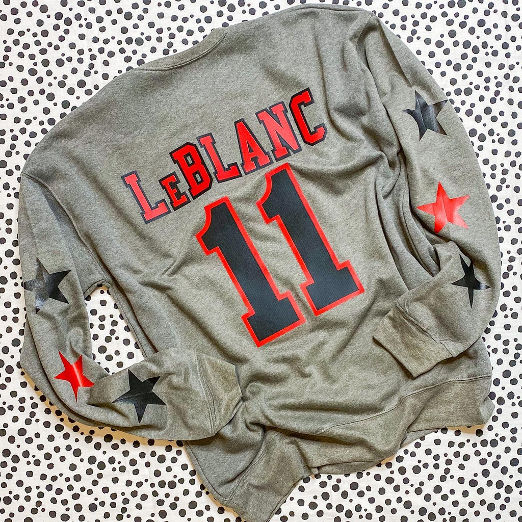 custom SPIRIT SPRINKLES sweatshirt - text on front, name/number on back and 3 stars down each sleeve