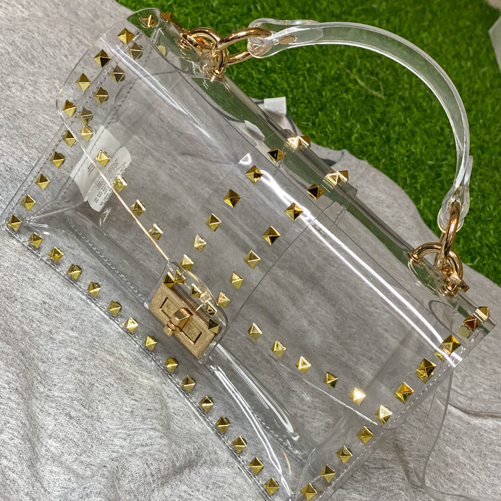 clear bag with gold accents